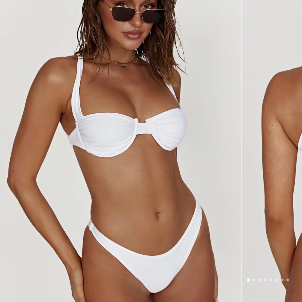 White Meshki bikinis. Top size XXS, bottoms XS. didn't fit my body type.